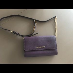 Michael Kors Bags - Purple cross body purse. Michael Kors Bags - Purple cross body purse.
